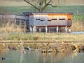 Bird observation post Hide in water bird protection area Flachsee Vogelbeobachtungsstand im Wasservogelschutzgebiet Flachsee Royalty Free Stock Photo