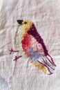 Bird of paradise handmade embroidered smooth decoration on white fabric , vintage folk embroidery in Belarus, second half of 19