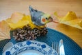 Parrot waiting for guests. Bird prepares for Thanksgiving. Cockatiel parrot