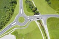 Bird`s eye top view of the roundabout with three single-ended streets with green areas Royalty Free Stock Photo