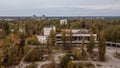 Bird`s eye view of the abandoned ruined multi-storey buildings at the street block in Pripyat ghost town