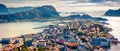 From the bird`s eye view of Alesund port town on the west coast of Norway, at the entrance to the Geirangerfjord. Colorful mornin Royalty Free Stock Photo