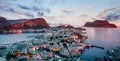 From the bird`s eye view of Alesund port town on the west coast of Norway, at the entrance to the Geirangerfjord. Colorful sunset Royalty Free Stock Photo