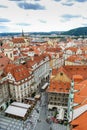 Bird`s eye view of the city of Prague with overcast sky seen from the Old Town Hall Tower, also known as the Clock Tower Royalty Free Stock Photo