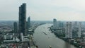 Bird`s eye view from drone of cityscape metropolis infrastructure, crossing streets with parked cars Royalty Free Stock Photo