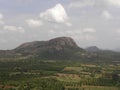 Bird`s eye view of mountains, green trees, forest, fields and meadow Royalty Free Stock Photo