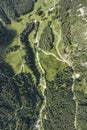 bird`s-eye view of the musauer alm with lush green meadows, forests and winding hiking trails
