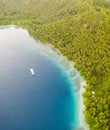 Aerial of Island, Ship, and Fringing Reef in Papua New Guinea