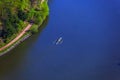 Bird's eye view of a river with people in a canoe Royalty Free Stock Photo