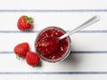 Strawberry jam on a cloth background