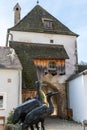 Bird sculptures made of metal in front of the Brucktor in Essing in Bavaria, Germany at the Altmuehl river