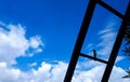 Bird sitting on stairs, blue sky, nature photography, natural gardening background, scenic wallpaper Royalty Free Stock Photo