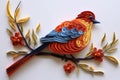 A bird on a tree branch in the technique of quilling. Papercraft, hobby concept