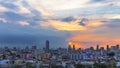 Bird view over city with sunset and clouds in the evening. Royalty Free Stock Photo