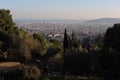 Bird view panorama of cityscape of Barcelona, capital of Catalonia, Spain from Park Guell before sunset with blue sky Royalty Free Stock Photo