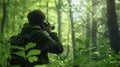 The bird watcher using binocular and searching for the bird in a forest. AIG43.