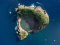 Bird's eye view shot of the Ilheu de Vila Franca do Campo, the crater of an old underwater volcano Royalty Free Stock Photo