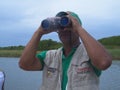 Birders in the outdoors birdwatching during Global Shorebird Counting Program