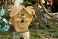 Birdhouse in the form of a grandfather