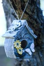 Birdhouse hanging on a tree