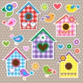 Birdhouses,birds and flowers Royalty Free Stock Photo