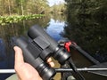 Birding with binoculars from a canoe in Okefenokee Swamp Georgia Royalty Free Stock Photo