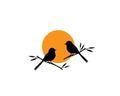 Birds couple silhouette on branch on sunset, vector Royalty Free Stock Photo