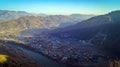 Birds eye view of city of town with beautiful beaches and mountain range on a sunny day. Aerial view of Town city with Peak Royalty Free Stock Photo