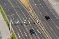 Birds eye view of half-empty road with cars, driverless technology concept