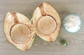 Open Coconut with Meat on a Natural Weathered Wood Background Royalty Free Stock Photo