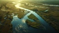 A birds eye view of a meandering river its surface reflecting the backlit sky Royalty Free Stock Photo