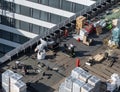 Birds eye view of a roof construction site. Professional bitumen waterproofing on a flat building