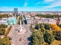 Birds eye view shot of Lattelecom marathon by the statue of liberty - Milda in Riga, Latvia