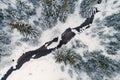 Birds eye view of small river in snowy forest Royalty Free Stock Photo