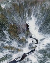 Birds eye view of small river in snowy forest Royalty Free Stock Photo