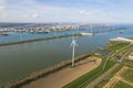 birds-eye view of some modern windmills for electricity generation and an oil refinery, Botlek, Netherlands