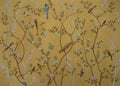 Birds and flowers on gold background