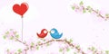 Birds in love on blossom branches