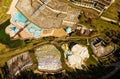 Birdseye view photo of graphic colorful mineral terraces and travertine formations in Egerszalok spa