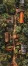A birdseye view of a tiny house compound, blending into a rewilded landscape, designed to encourage prosocial behavior and Royalty Free Stock Photo