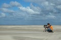 Birdwatcher on beach, Vogelaar op strand Royalty Free Stock Photo