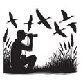 Birdwatcher Silhouette Observing Cranes Flying Through the Sky Royalty Free Stock Photo