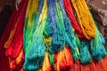 Birghtly colored yarn for sale at a market in Srinagar