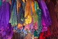 Birghtly colored yarn for sale at a market in Srinagar