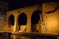 BIRGU, MALTA - Jul 18, 2014: Old arches connecting Fort St Angelo with the bastions surrounding the city of Birgu in Malta