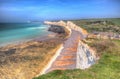 Birling gap beach near and the Seven Sisters chalk cliffs and Beachy head East Sussex UK in hdr Royalty Free Stock Photo