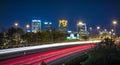 Birmingham alabama city skyline and highway traffic trails