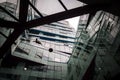 Birmingham, The Cube futuristic building open roof with man floating holding a balloon in sky