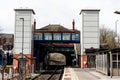 BIRMINGHAM, UK - March 2018 Old and New Architectural Structure of Railway Station near Tunnel. Train Tracks Curbing at Royalty Free Stock Photo