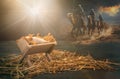 Birth of Jesus Christ in Bethlehem, star shinning on the manger, three kings riding on camels, desert night, religion and faith Royalty Free Stock Photo